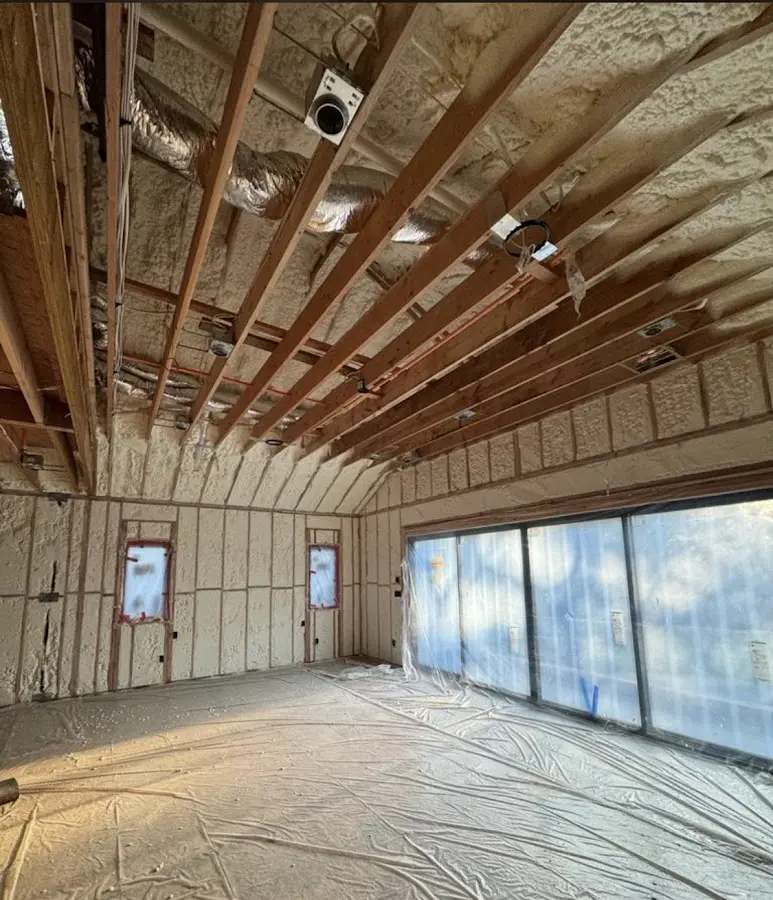 Interior walls and ceiling insulated with spray foam during new construction in Endicott